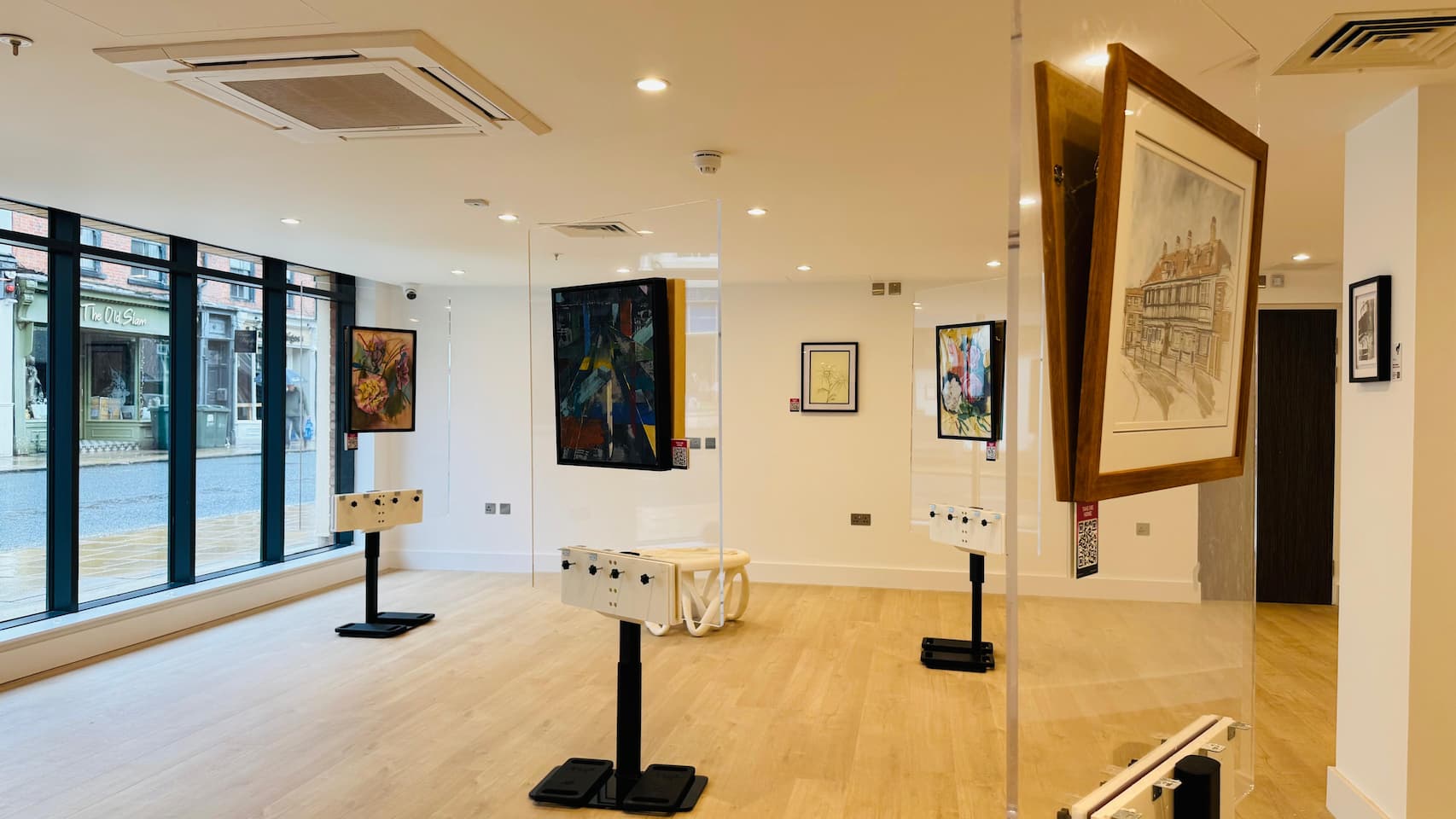 Curated artwork collection displayed in a hospitality space