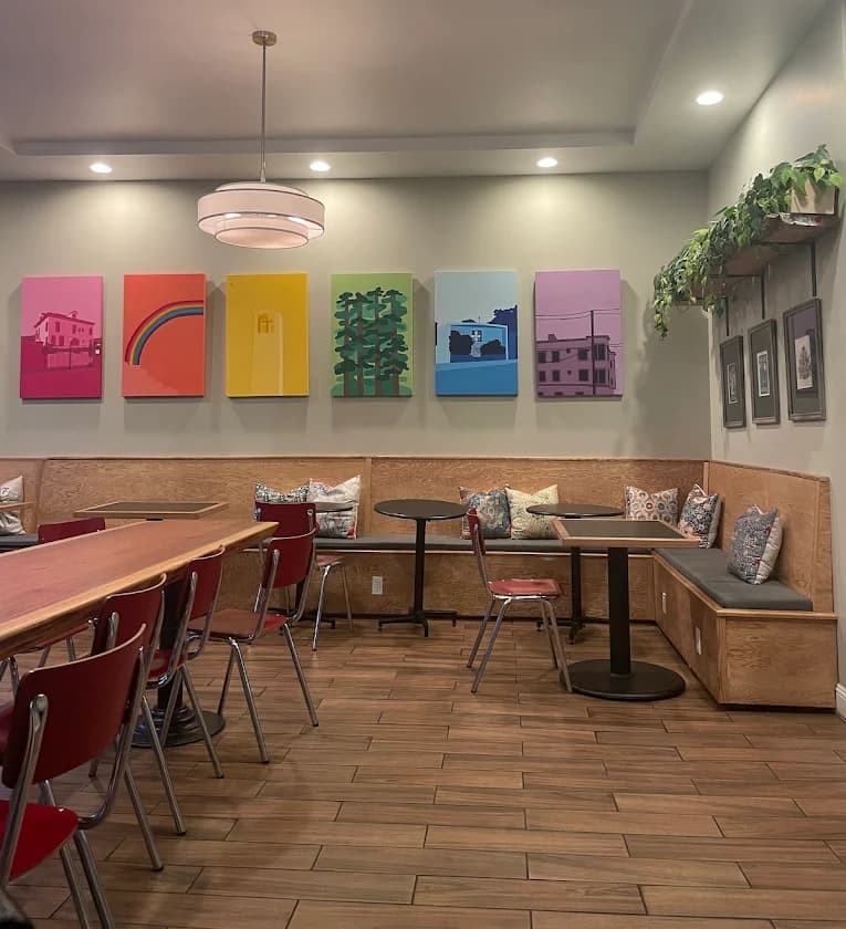 Original artwork displayed on the walls of Compton's Coffee House in San Francisco