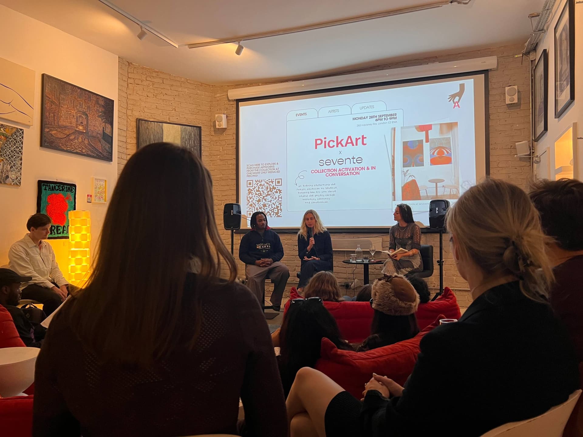 Panel conversation at Sevente in front of the PickArt × Sevente screen
